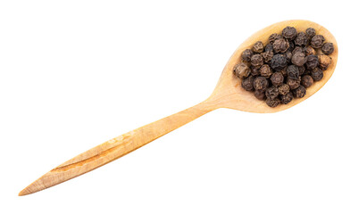 top view of hainan black pepper in wood spoon