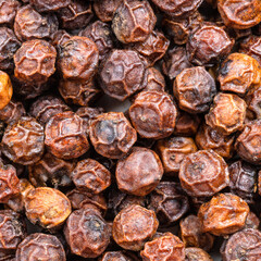 red kampot peppercorns close up