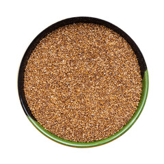whole-grain teff seeds in round bowl isolated