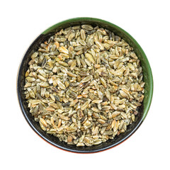 freekeh wheat grains seeds in round bowl isolated