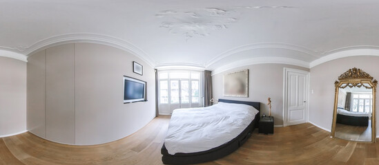 Wide angle 360 panorama interior of bedroom with ornamental molding on ceiling and wooden floor...