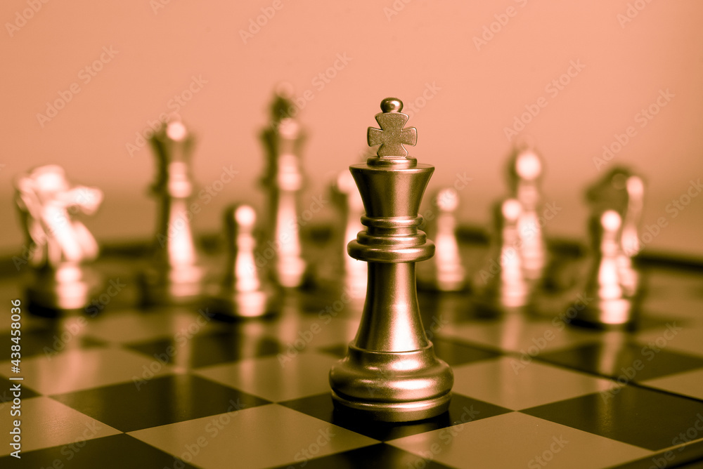 Poster closeup of chess characters on board games. to represent decision making in term of business strateg