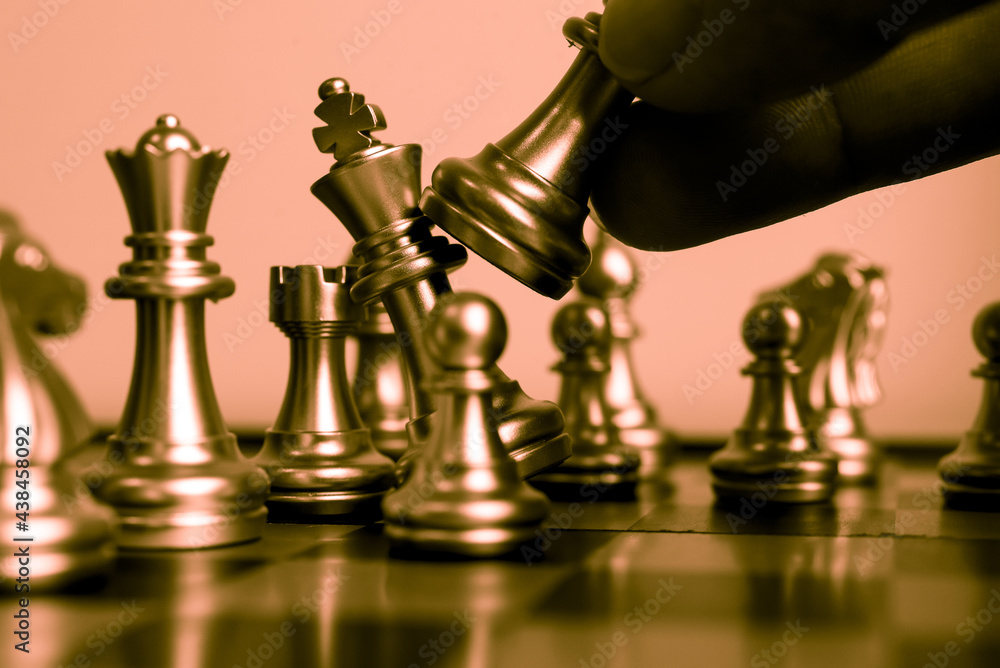 Poster closeup of chess characters on board games. to represent decision making in term of business strateg
