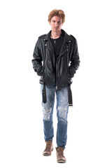 Fototapeta premium Displeased macho attitude young rocker in leather jacket walking and looking at camera. Full body length isolated on white background.