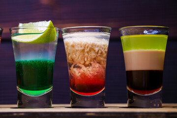 Alcoholic cocktail on wooden board