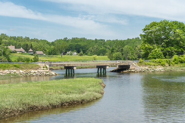 Fototapeta na wymiar Bridge Over River in Rural Coastal Maine