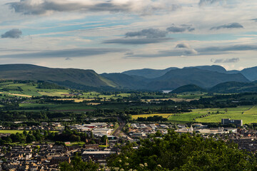 Fototapeta na wymiar A view looking over Penrith towards Ullswater and the surrounding fells in the English Lake District