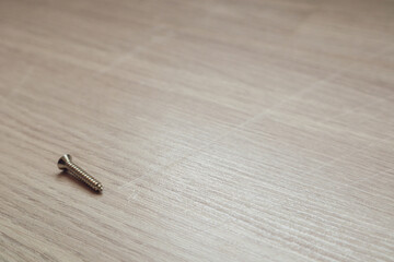 The surface of the laminate flooring has abrasions from being scraped.