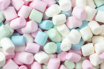 Colorful marshmallows background close up. Fluffy cute marshmallows 