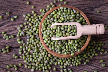 Mung bean seeds on wood table.