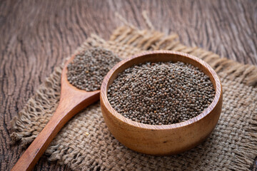 Perilla seeds on wood table.