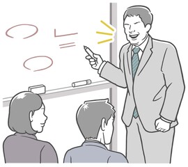 会議室のホワイトボードの前で説明する、中年男性