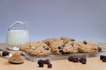 Homemade oat cookies with a glass of milk