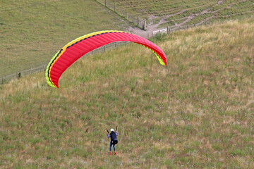 Paraglider flying at Milk Hill, Wiltshire	