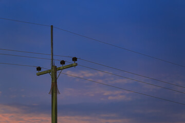 Electric poles and the sky at dusk