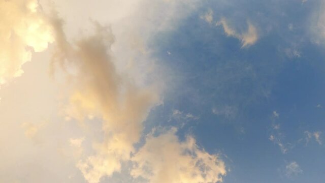 Time lapse of the directly above clouds in the sky during the sunset
