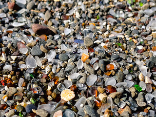 Weathered glass on the ground at Glass Beach in Fort Bragg, CA 