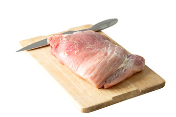 piece of pork on wooden board isolated on white background