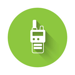 White Walkie talkie icon isolated with long shadow background. Portable radio transmitter icon. Radio transceiver sign. Green circle button. Vector