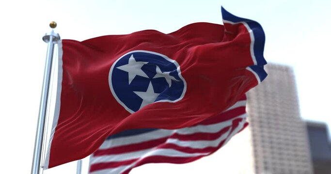 The flags of the Tennessee state and United States of America waving in the wind. Democracy and independence. American state. Seamless 3D animation