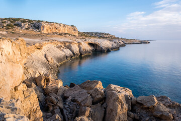 Fototapeta na wymiar Cliff at the Mediterranean sea shore. Capo Greco cape in Ayia Cyprus
