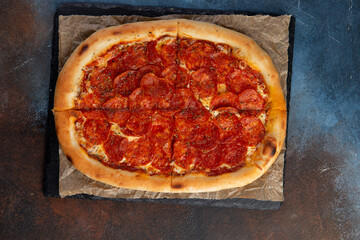 Pepperoni Pizza - Fresh homemade pizza with pepperoni, cheese and tomato.