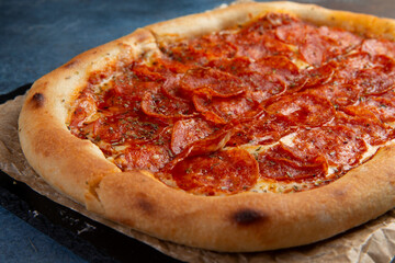 Pepperoni Pizza - Fresh homemade pizza with pepperoni, cheese and tomato.