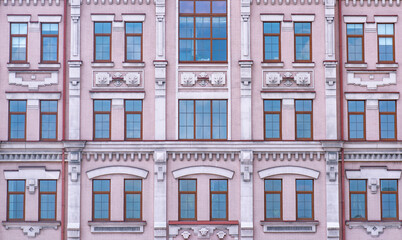 Texture of the building with several windows