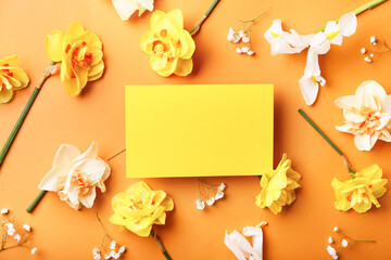 Beautiful flowers and blank card on color background