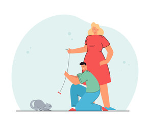 Man and woman playing with cat. Happy couple spending time together, teasing kitten with bow on string. Indoor activity. Keeping domestic animals concept for banner, website design, landing web page