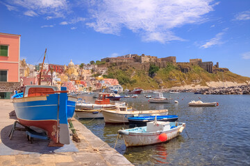 Panoramic view of Procida, Italian Capital of Culture 2022: colorful houses, cafes and restaurants,...