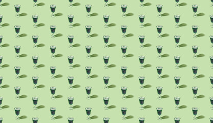 Creative seamless pattern made of green spirulina algae drink. Healthy nutritional supplement.