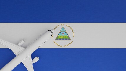 Top Down View of a Plane in the Corner on Top of the Country Flag of Nicaragua