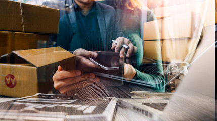 Business woman start up small business entrepreneur SME success .freelance woman working at home with Online Parcel delivery. SME and packaging deliveryconcept