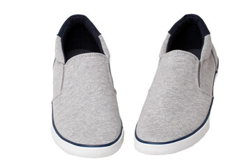 Mans gray shoes. Close-up of a pair gray sneaker or sport shoes isolated on a white background. Elegant and trendy mens footwear. Macro.