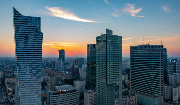 Warsaw, Poland - March 27, 2017: A picture of the business district of Warsaw at sunset.