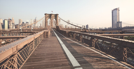 Panoramic view of Brooklyn Bridge, color toned picture, New York City, USA.