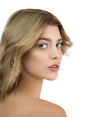 Fototapeta premium Beautiful young woman with perfect skin and wavy hair. Fashion model with nice professional make-up posing in the studio, isolated on white.