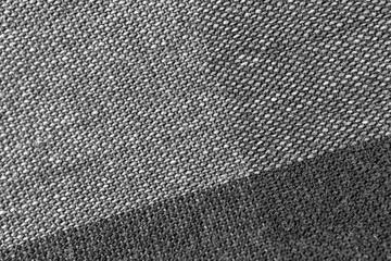 Black fabric texture of natural cotton or linen textile material, shirt cloth close-up, high resolution background