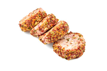 Raw meat patties with spices, four pork cutlets isolated on white