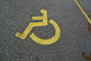 sign on tar from person in wheelchair