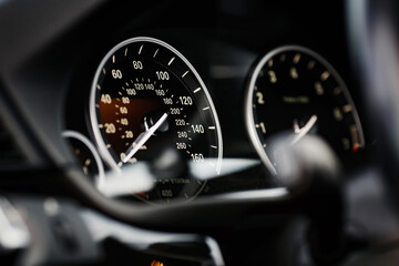 Close up shot of a speedometer in modern car.