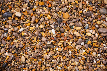 Colorful pebbles and stones on Lake Michigan shoreline.