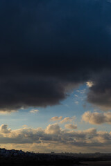 Obraz na płótnie Canvas Blue sky with gray clouds at daytime