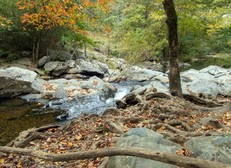 A gently rolling stream on a warm fall day provides a feeling of peace, tranquility, joy and quiet...