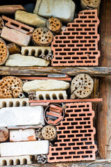 Insect hotel made of bricks, stones and wood