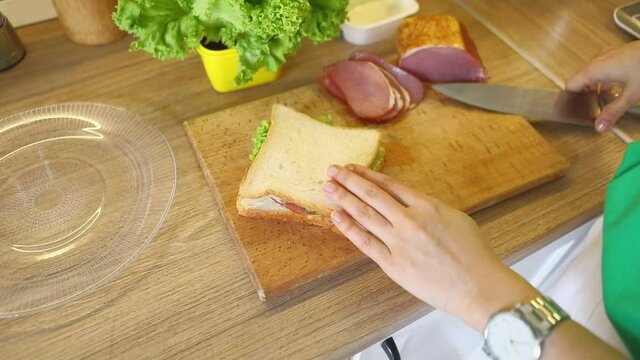 woman cooking sandwich at the kitchen overhead top view