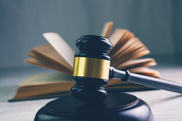 the judge's hammer and the book on the table