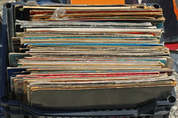 Stack of vinyl records on flea market