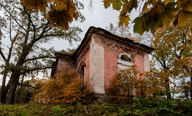 old destroyed building in autumn afternoon